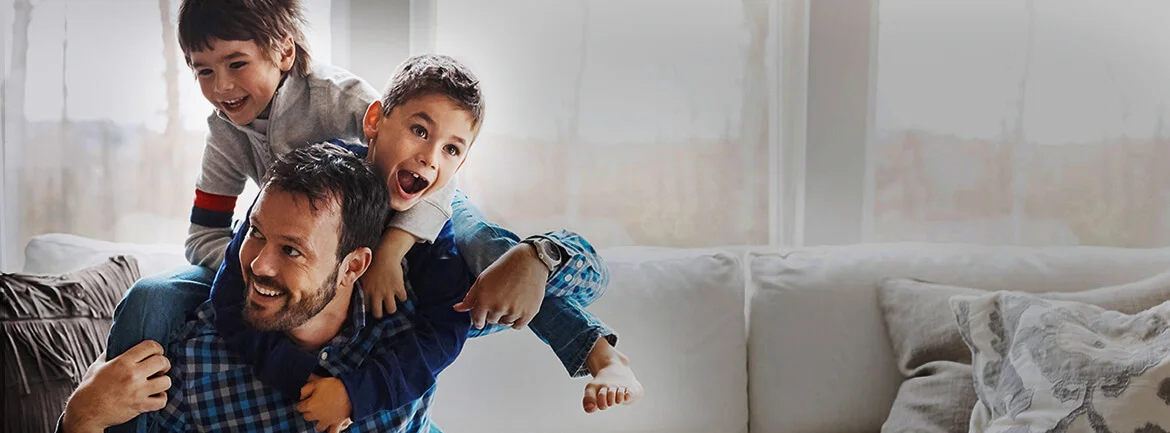 a person holding a child