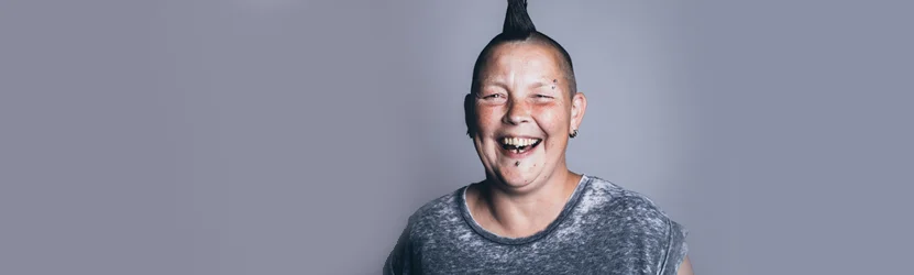 a person with a black haircut