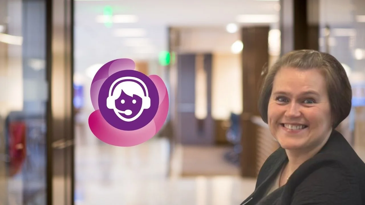 a woman smiling at the camera